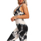 Fitted Backless Jumpsuit With Criss Cross Straps.