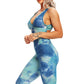 Fitted Backless Jumpsuit With Criss Cross Straps.
