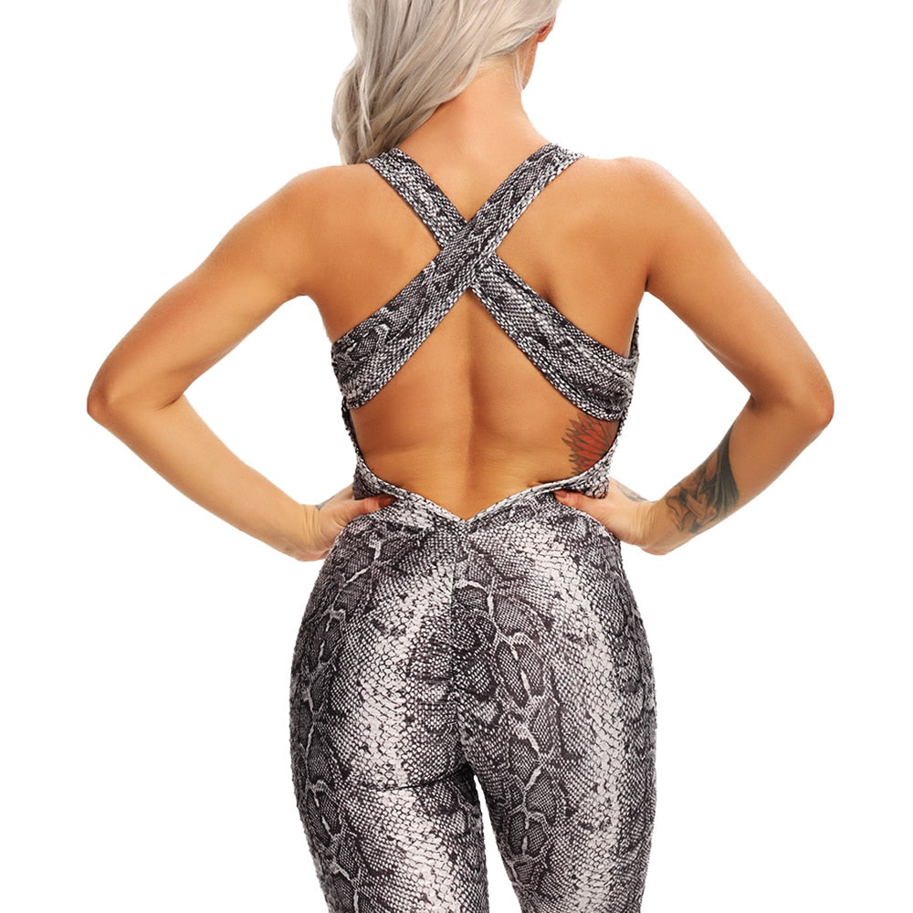 Fitted Backless Jumpsuit With Criss Cross Straps.