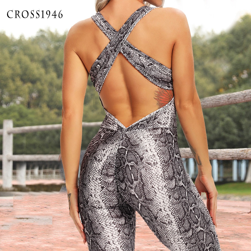 Fitted Backless Jumpsuit With Criss Cross Straps.