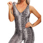 Fitted Backless Jumpsuit With Criss Cross Straps.